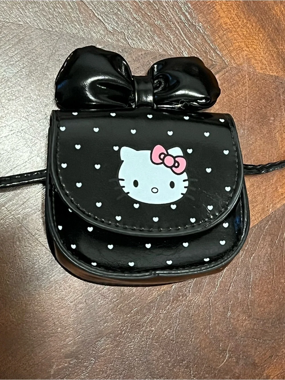 Hello Kitty Black Patent Mini Bow Crossbody Bag with Pink Bow Accent